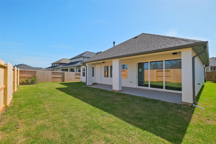 Exterior details and patio area of a home in Sienna 65', Missouri City (Image 3).