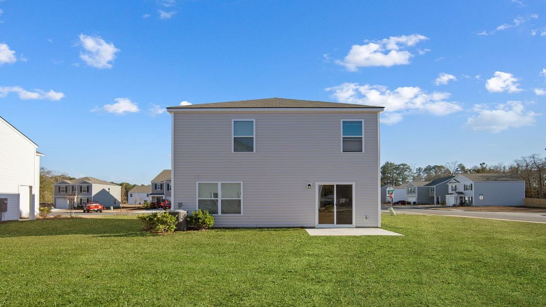 Exterior details and patio area of a home in Longleaf Village, Rincon (Image 2).