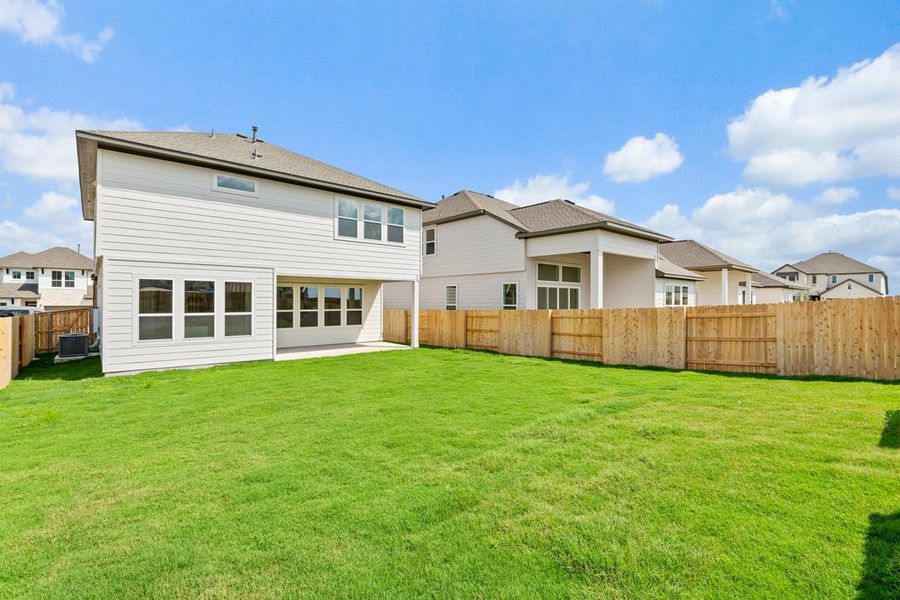 Front exterior of a new home in Arbor Collection At Park Central, Georgetown, TX, highlighting curb appeal (Image 1).