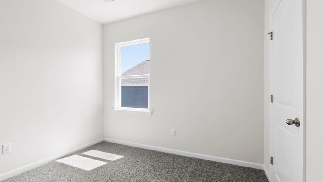 Spacious, unfurnished interior of a new home in Durbin Meadows Traditions, Fountain Inn (Image 16).