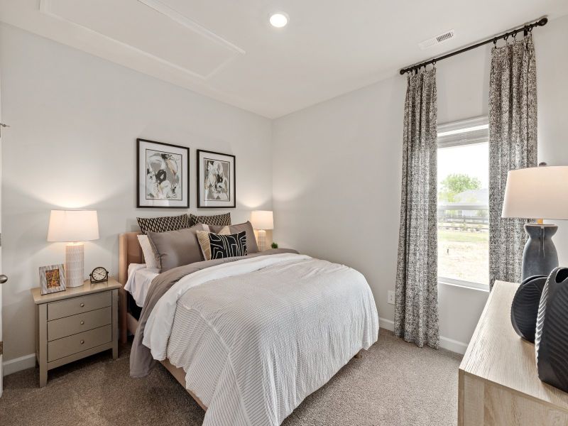 The Chandler floorplan includes two unique secondary bedrooms.