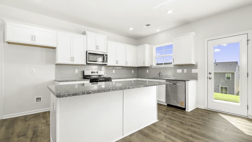 Representative furnished interior of a home built from the WINSTON by D.R. Horton in The Preserve at Kinsley, Jamestown (Image 4).