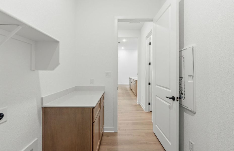 Furnished interior view inside a new home in 6 Creeks, Kyle (Image 10).