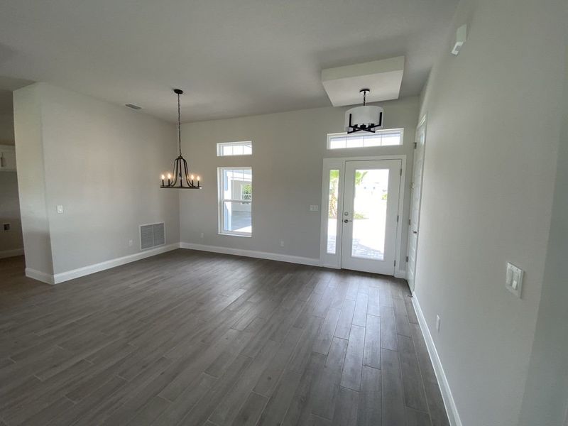 Representative unfurnished interior of a home built from the Oakmont by Paytas Homes in The Reserve at Victoria, Deland (Image 9).