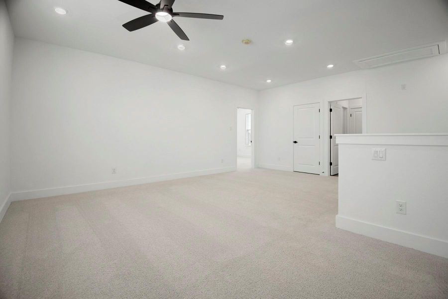 Spacious, unfurnished interior of a new home in Hallimore Ranch, Rosenberg (Image 10). Spacious, unfurnished interior of a new home in Hallimore Ranch, Rosenberg (Image 10).