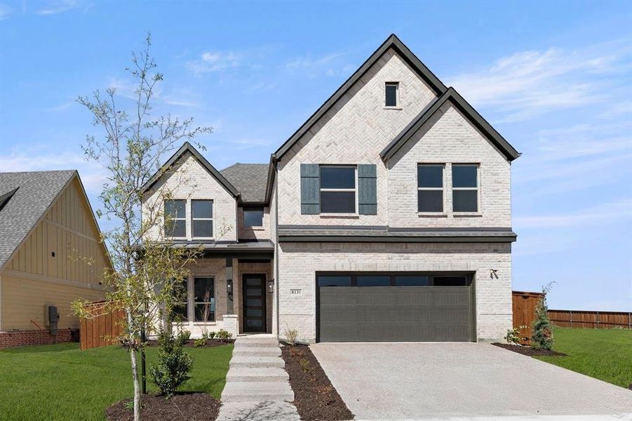 Front exterior of a new home in Inspiration, Lucas, TX, highlighting curb appeal (Image 2).