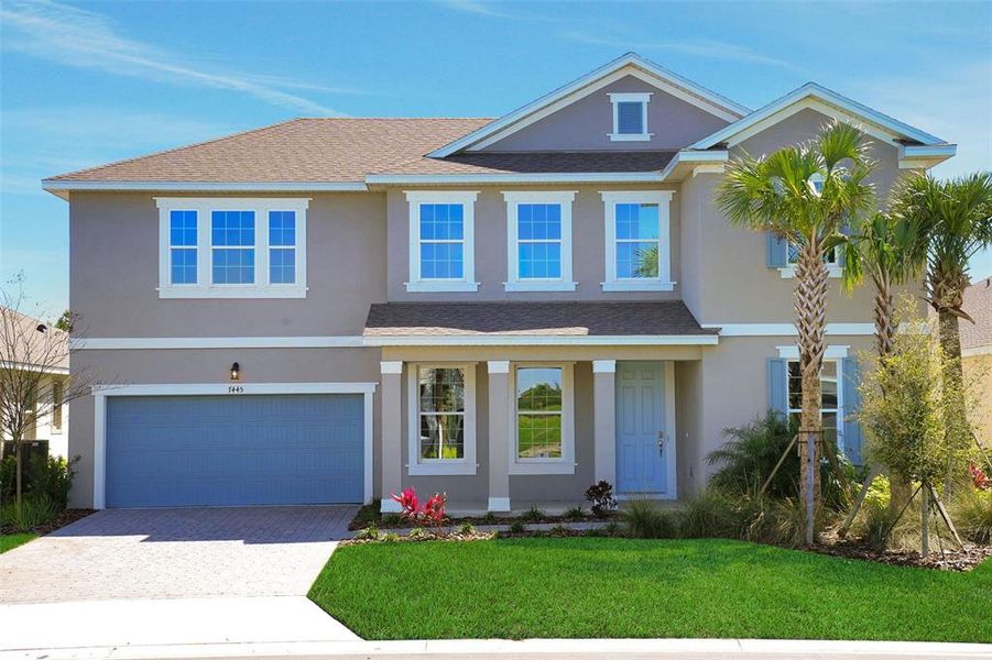 Front exterior of a new home in Seaire, Parrish, FL, highlighting curb appeal (Image 2). Front exterior of a new home in Seaire, Parrish, FL, highlighting curb appeal (Image 2).