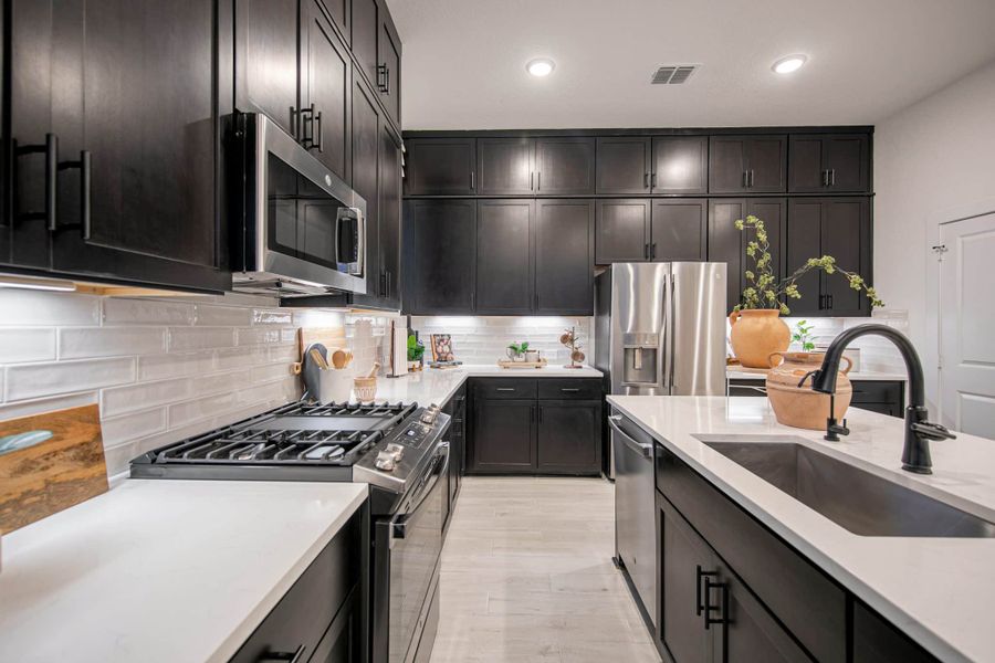Furnished interior view inside a new home in Santa Rita Ranch, Liberty Hill (Image 27). Furnished interior view inside a new home in Santa Rita Ranch, Liberty Hill (Image 27).