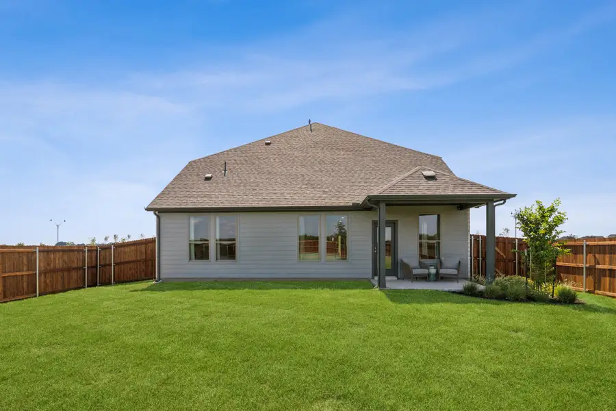 Backyard in the Winters home plan by Trophy Signature Homes – REPRESENTATIVE PHOTO