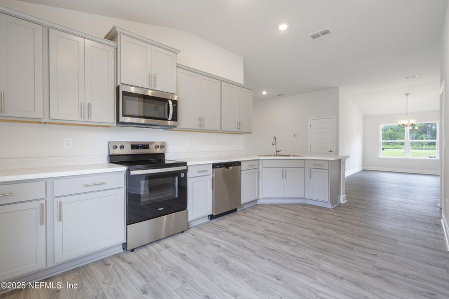 Furnished interior view inside a new home in Summerglen, Jacksonville (Image 3).
