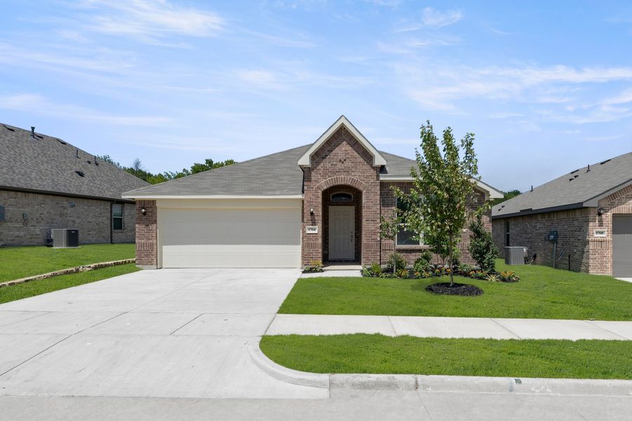 Front exterior of a new home in ValleyBrooke, Mesquite, TX, highlighting curb appeal (Image 1). Front exterior of a new home in ValleyBrooke, Mesquite, TX, highlighting curb appeal (Image 1).