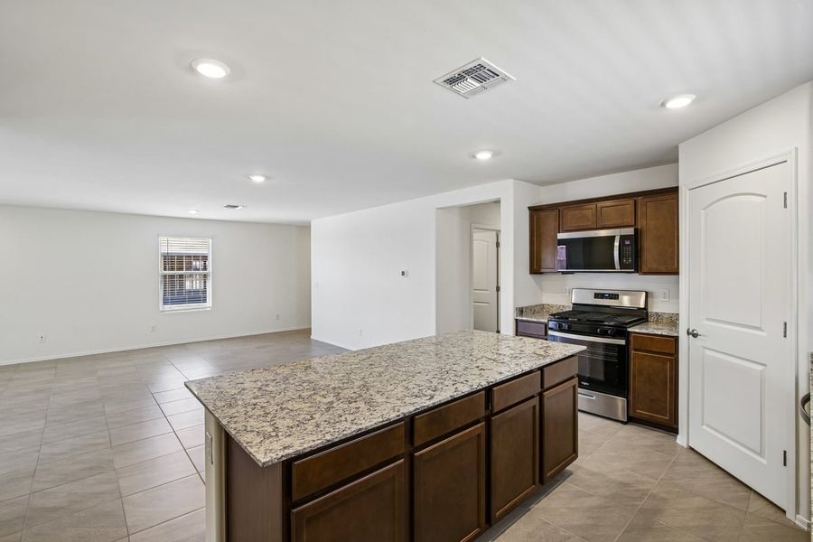 Furnished interior view inside a new home in Mandarina Reserve, Marana (Image 8).