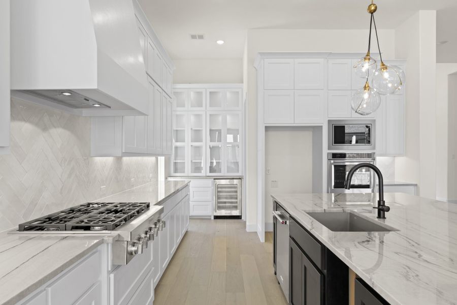 Representative furnished interior of a home built from the 5551 by Tradition Homes in Windsong Ranch, Prosper (Image 8).