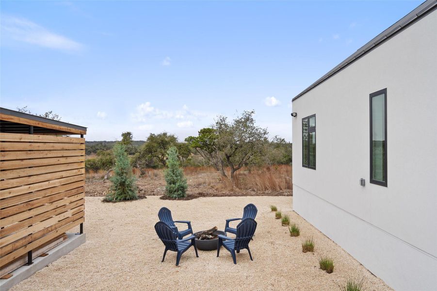 Exterior details and patio area of a home in , Wimberley (Image 25).
