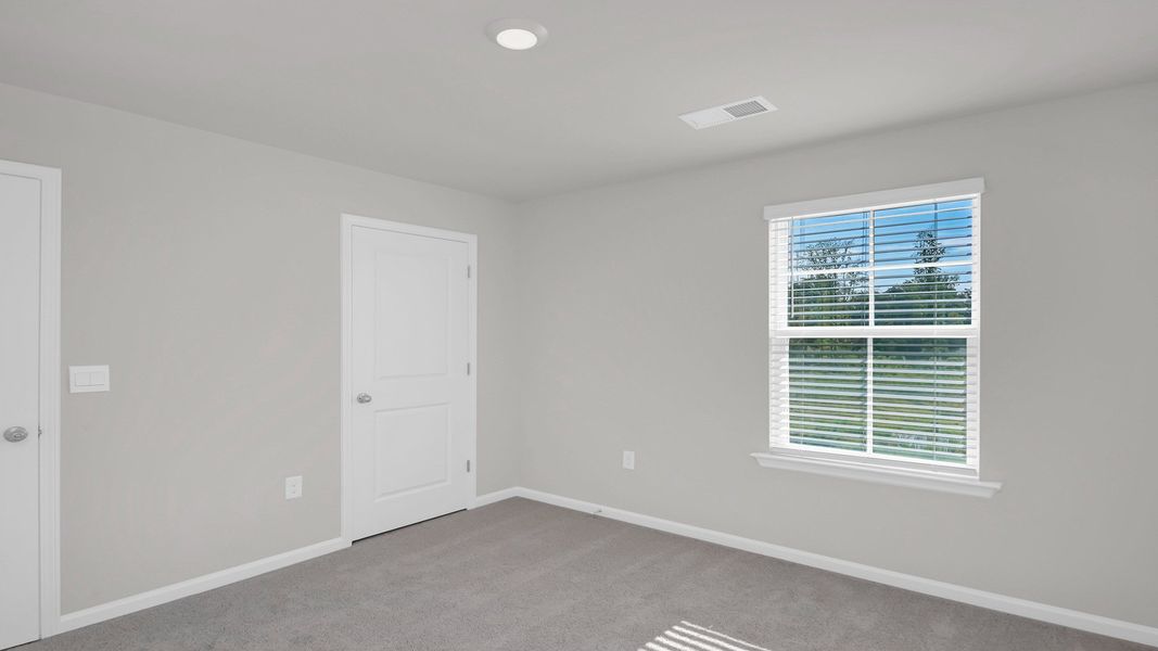 Representative unfurnished interior of a home built from the ROBIE by D.R. Horton in Ferry Grove, Lexington (Image 37).