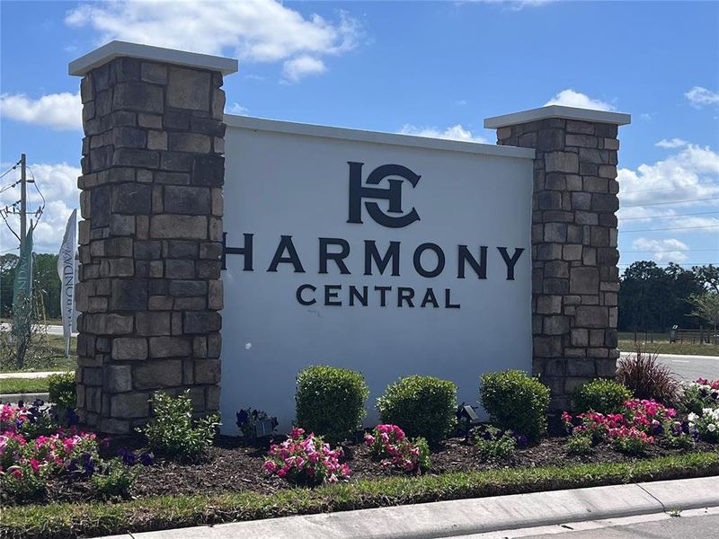 Front exterior of a new home in Harmony Central, Harmony, FL, highlighting curb appeal (Image 21).