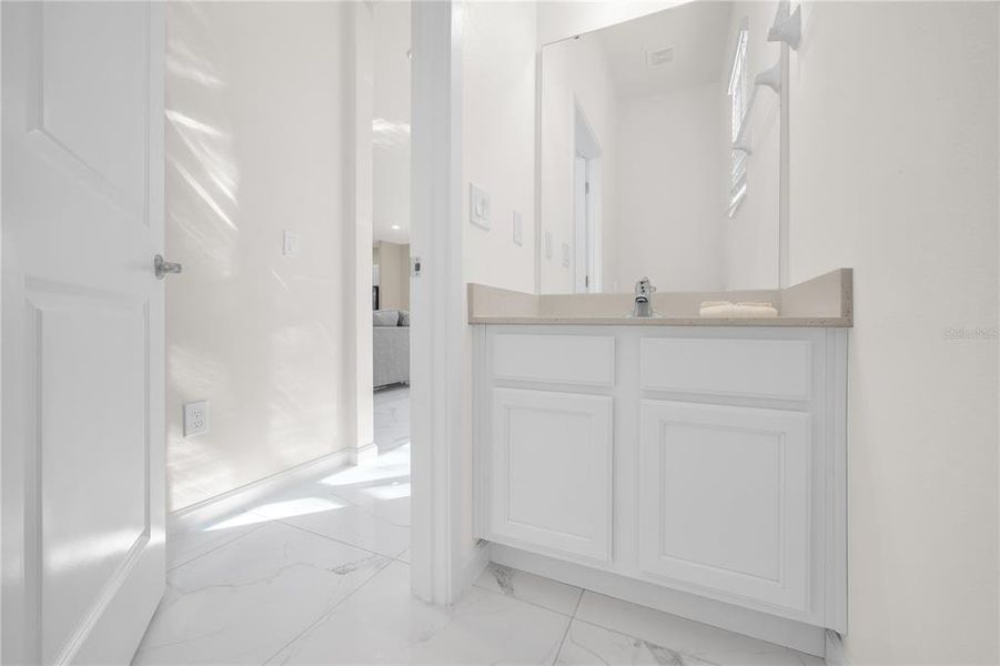 Furnished interior view inside a new home in , Kissimmee (Image 40).