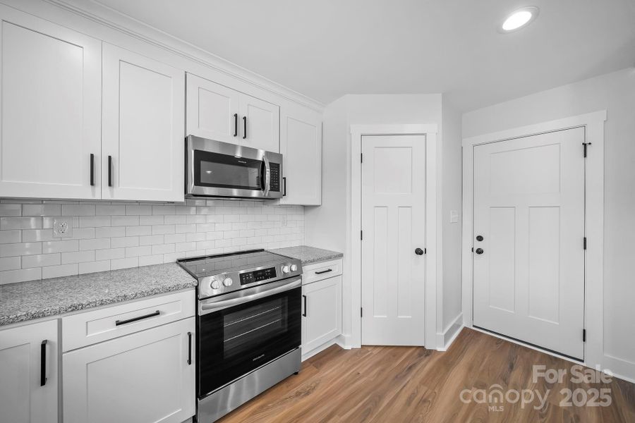 Furnished interior view inside a new home in , Wingate (Image 12).