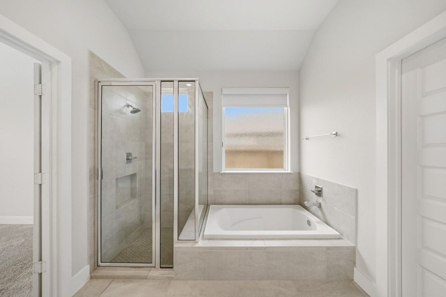 Luxurious soaking tub and separate shower create a spa-like retreat at home. Luxurious soaking tub and separate shower create a spa-like retreat at home.