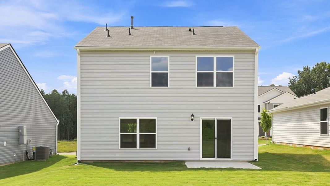 Exterior details and patio area of a home in Tyger Pines, Moore (Image 20).