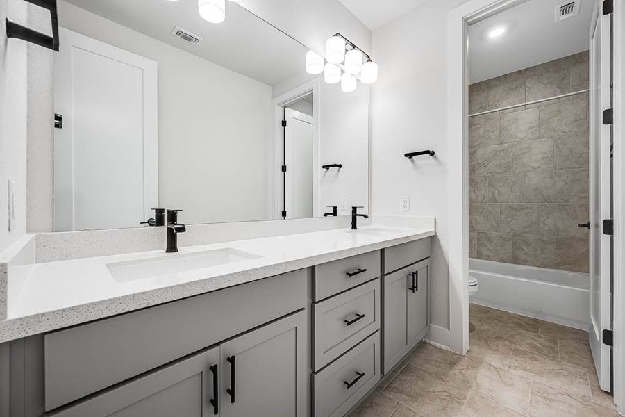 Furnished interior view inside a new home in 6 Creeks, Kyle (Image 12).