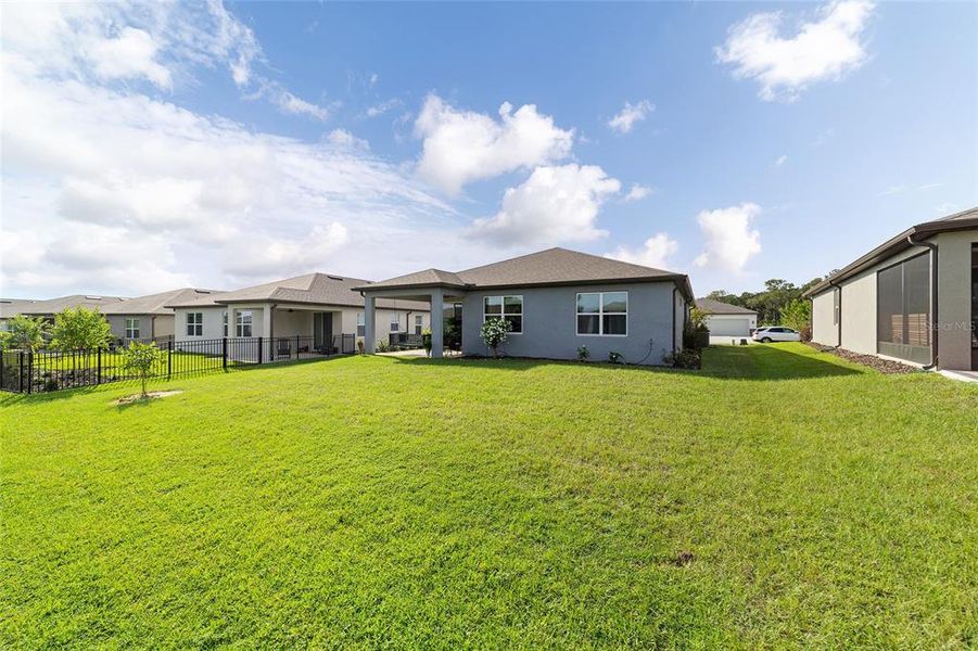 Exterior details and patio area of a home in Del Webb Stone Creek, Ocala (Image 2).
