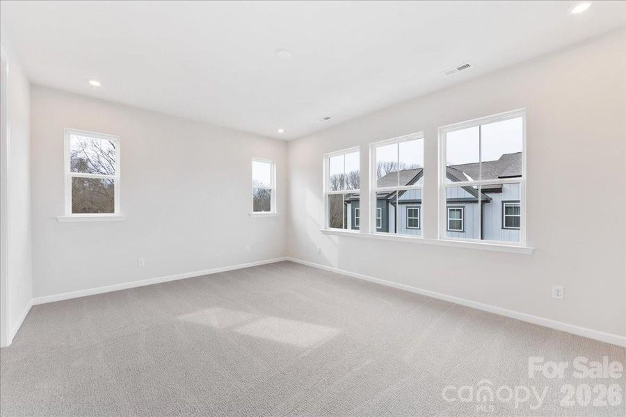 Primary Bedroom with AMple Natural Light Primary Bedroom with AMple Natural Light