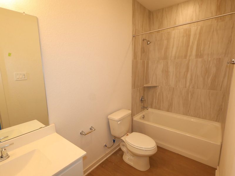 Furnished interior view inside a new home in Lone Star Landing, Montgomery (Image 11).