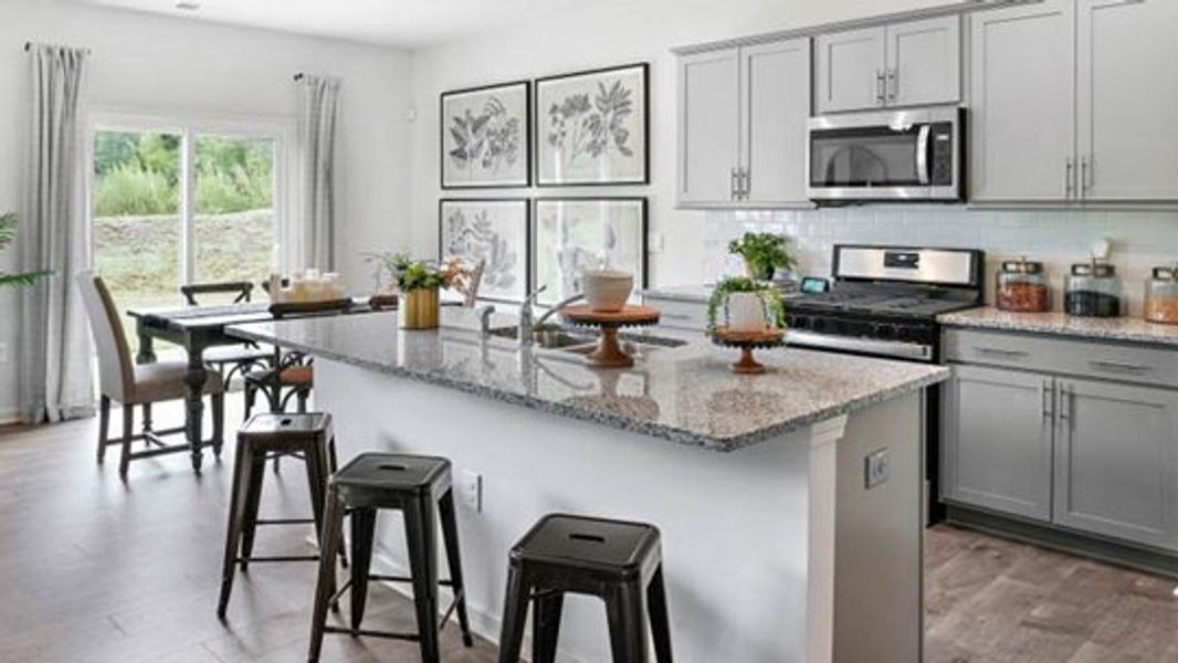 Furnished interior view inside a new home in Villa Grande, Winterville (Image 8).