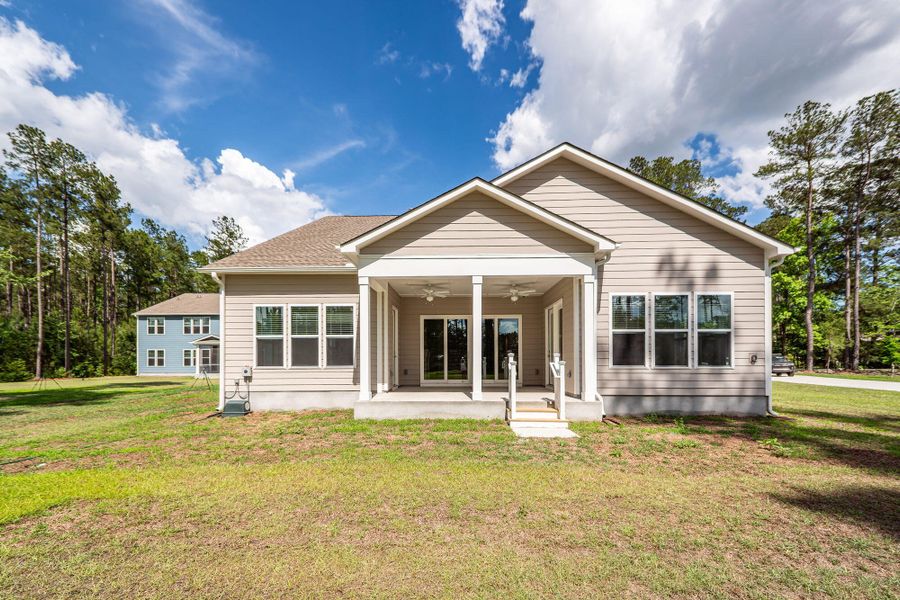 Exterior details and patio area of a home in , Ridgeville (Image 24).