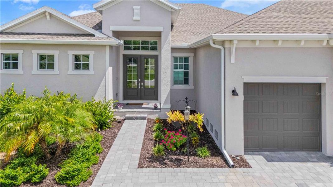 Front exterior of a new home in , Port Charlotte, FL, highlighting curb appeal (Image 26). Front exterior of a new home in , Port Charlotte, FL, highlighting curb appeal (Image 26).