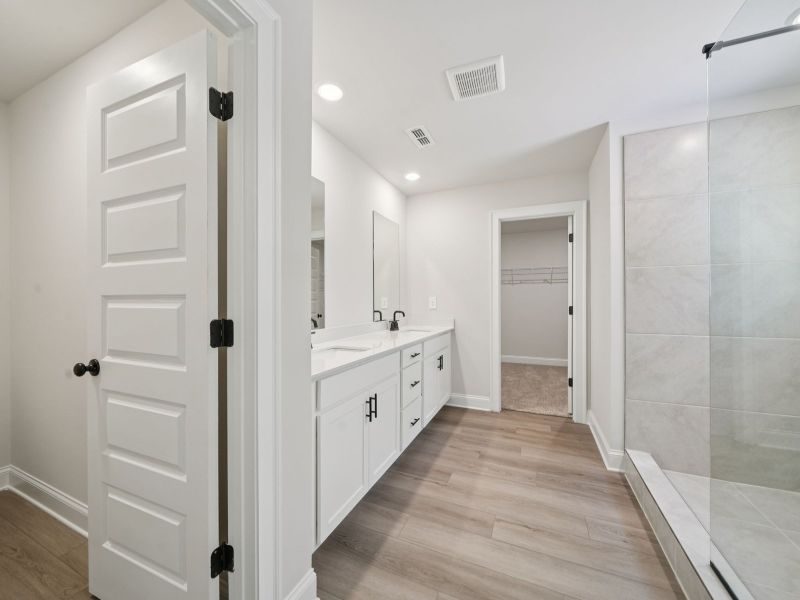 Furnished interior view inside a new home in Martin Springs - Estate Series, Lawrenceville (Image 8).