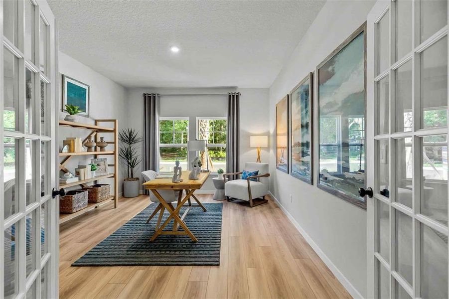 Furnished interior view inside a new home in The Cypress Series at Reserve East, Flagler Beach (Image 13).