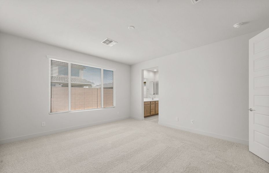 Spacious, unfurnished interior of a new home in Blossom Rock, Apache Junction (Image 16).