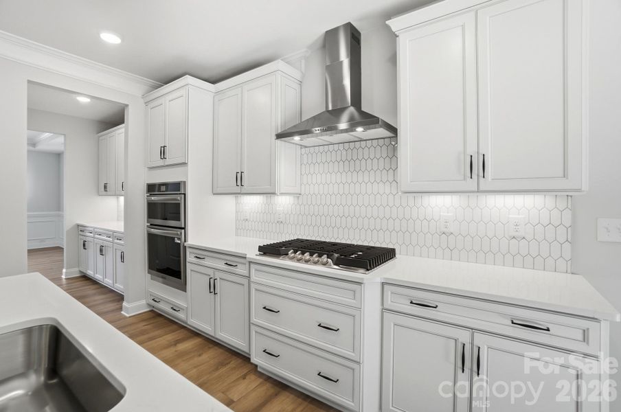 White cabinets and quartz countertops
