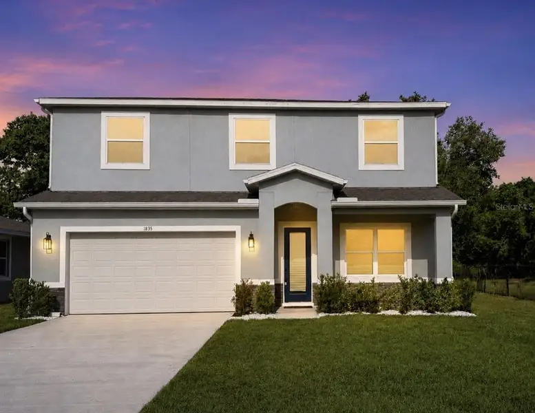 Front exterior of a new home in , Sanford, FL, highlighting curb appeal (Image 2). Front exterior of a new home in , Sanford, FL, highlighting curb appeal (Image 2).