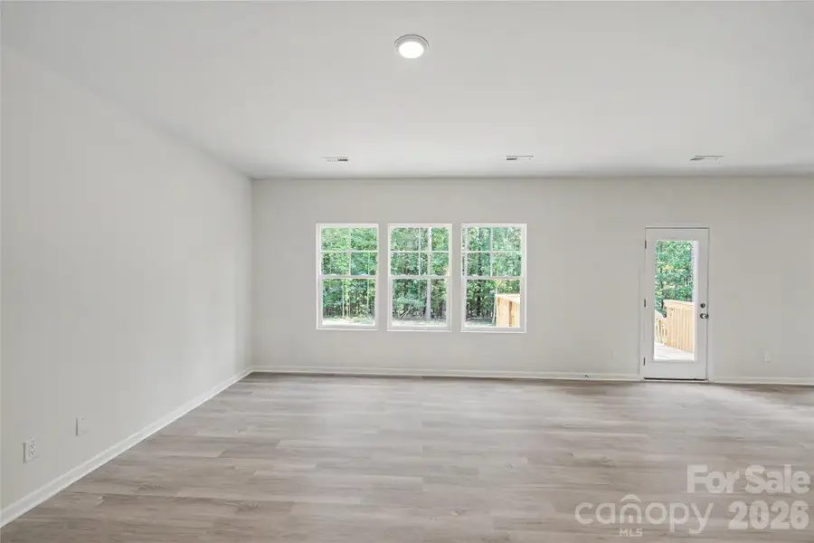 Spacious, unfurnished interior of a new home in , Iron Station (Image 15).