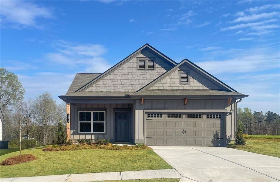 Front exterior of a new home in Summerfield Place, Carrollton, GA, highlighting curb appeal (Image 1). Front exterior of a new home in Summerfield Place, Carrollton, GA, highlighting curb appeal (Image 1).