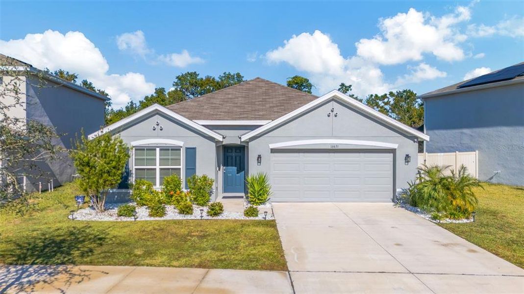 Front exterior of a new home in Sereno, Wimauma, FL, highlighting curb appeal (Image 26).
