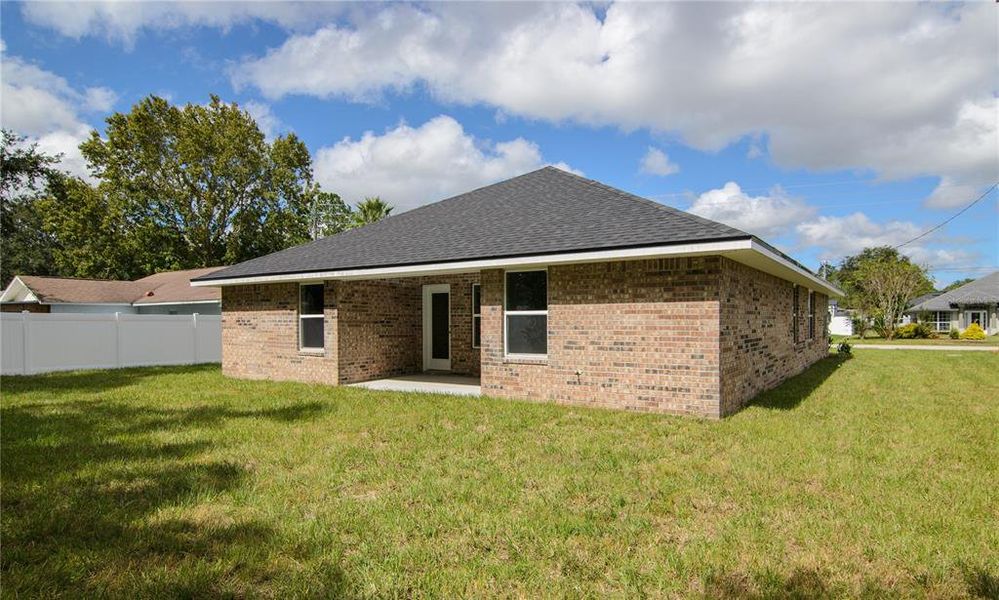 Exterior details and patio area of a home in Palm Coast, Palm Coast (Image 26).