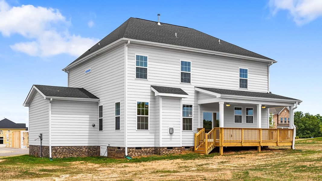 Exterior details and patio area of a home in Lilah Grove, Summerfield (Image 25).