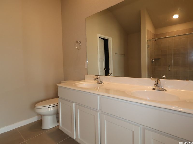 Furnished interior view inside a new home in Hickory Ridge, Elmendorf (Image 9).