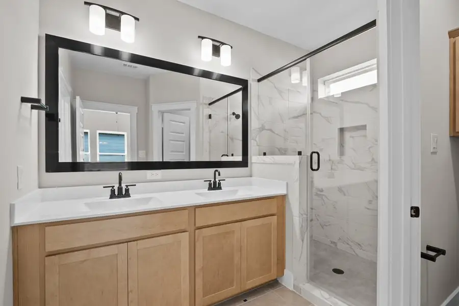 Representative furnished interior of a home built from the The Edmond by David Weekley Homes in Bridgeland Central: Emerald Heights - Cottages Row Collection, Cypress (Image 6).