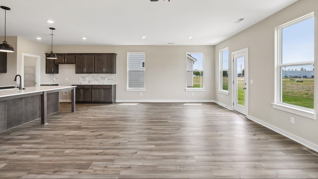 First Floor with hard surface flooring and kitchen