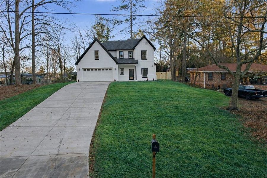 Front exterior of a new home in , Conyers, GA, highlighting curb appeal (Image 28).
