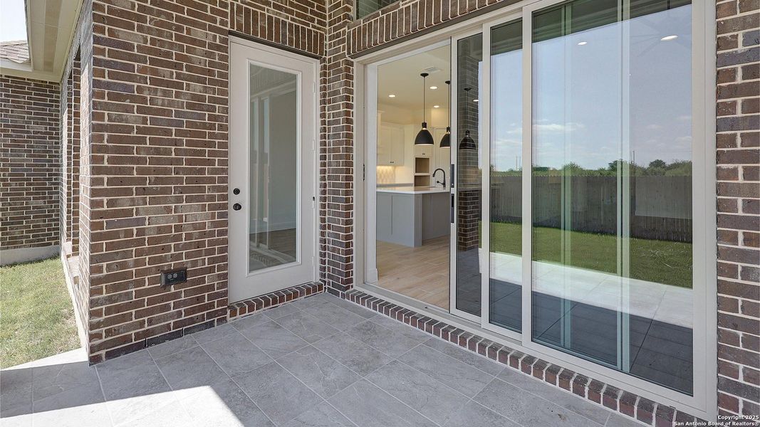 Furnished interior view inside a new home in Kallison Ranch 60', San Antonio (Image 9).