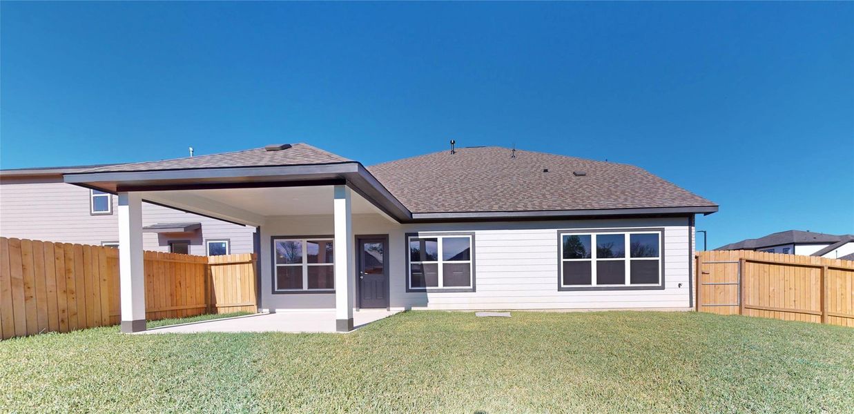 Exterior details and patio area of a home in Lexington Heights 50', Willis (Image 22).