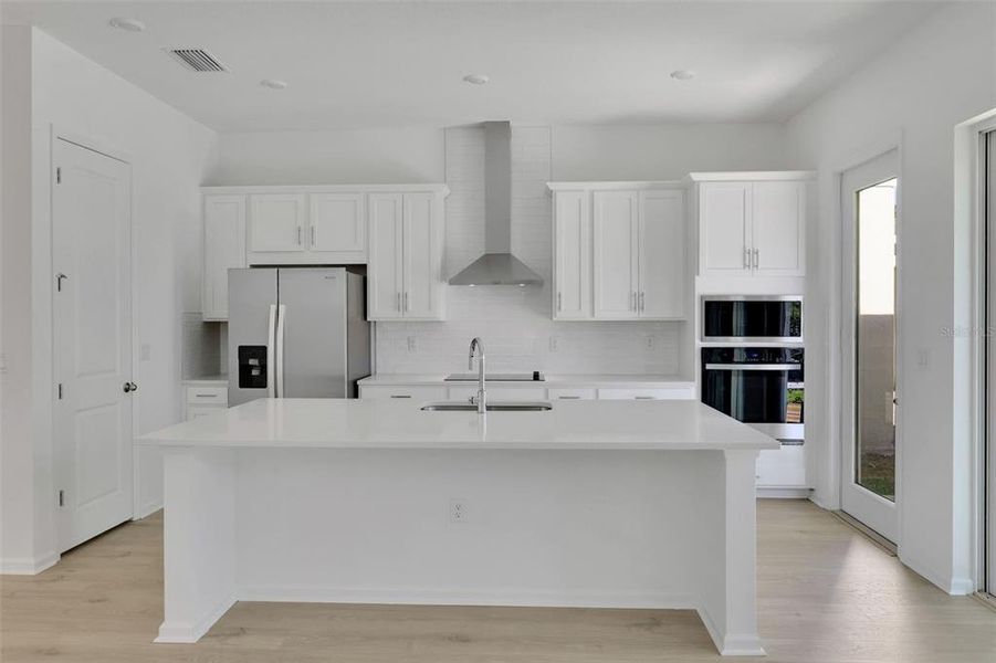 Furnished interior view inside a new home in Serenade at Ovation, Winter Garden (Image 14).