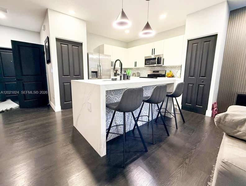 Furnished interior view inside a new home in , Coral Springs (Image 28).