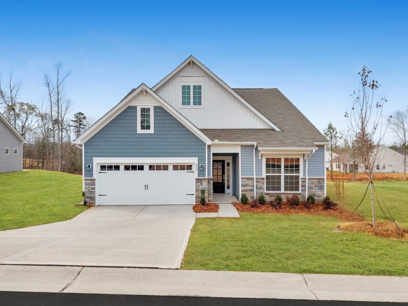 Front exterior of a new home in Arrowood Acres, Enoree, SC, highlighting curb appeal (Image 1).